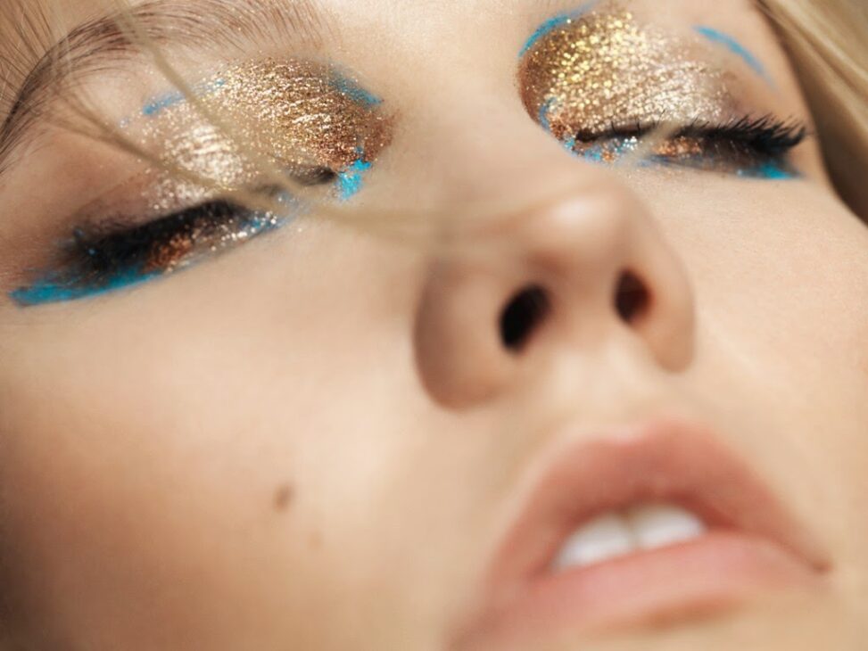 Close-up of Karlie Kloss golden eye shadow look.